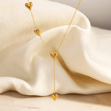 Racine™ — Collier Cœurs