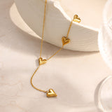 Racine™ — Collier Cœurs